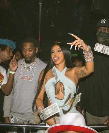 Celebrities having fun while watching entertainers Celebrities having fun while watching entertainers