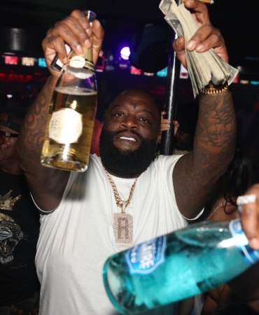 Rick Ross partying at Bobby Trap On The River 